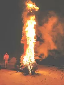 Submitted A towering inferno rises fueled by some 45 Christmas trees rose over Killington this weekend. 